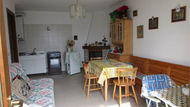 Soggiorno con angolo cottura
