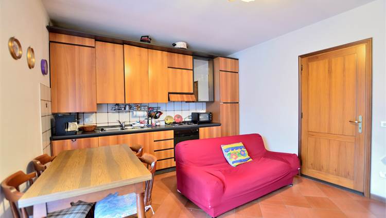 Soggiorno con angolo cottura