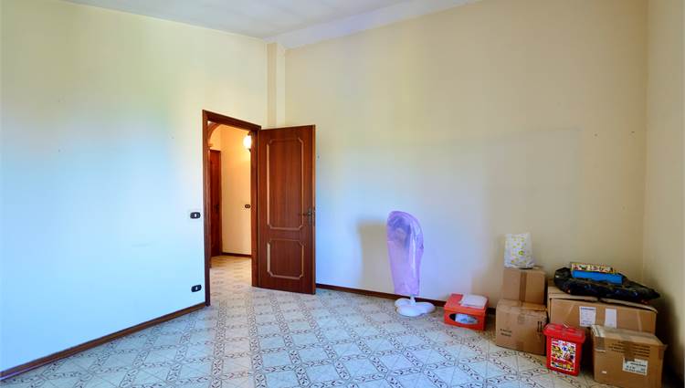 1a Camera appartamento al piano secondo