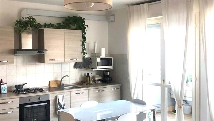 Soggiorno con angolo cottura